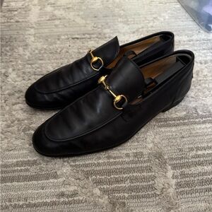 Gucci Black Leather Loafers with Gold Accents